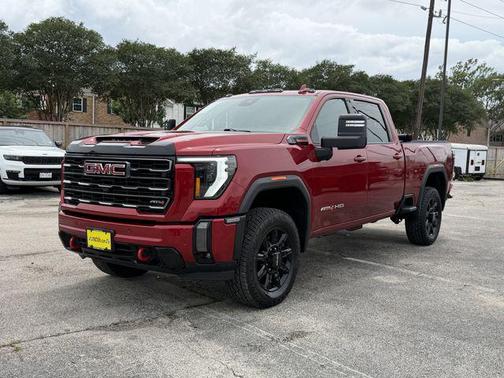 Volcanic Red Tintcoat 2024 GMC Sierra 2500 AT4