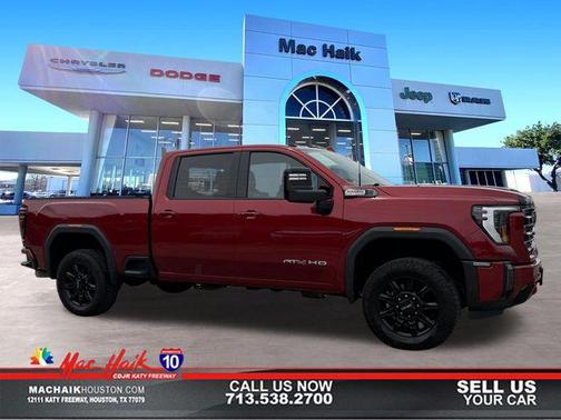 Volcanic Red Tintcoat 2024 GMC Sierra 2500 AT4