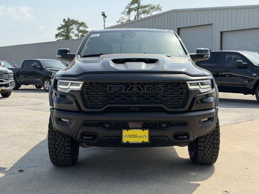 Diamond Black Crystal Pearlcoat 2026 RAM 1500 RHO Crew Cab 4x4 5'7' Box