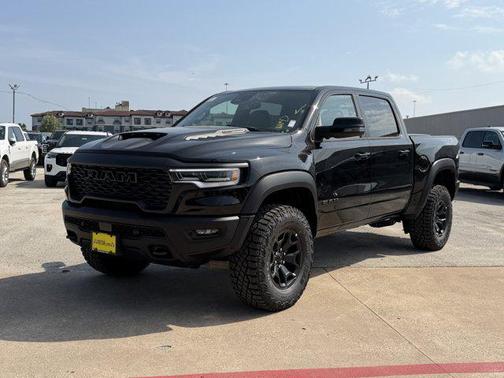 Diamond Black Crystal Pearlcoat 2026 RAM 1500 RHO Crew Cab 4x4 5'7' Box
