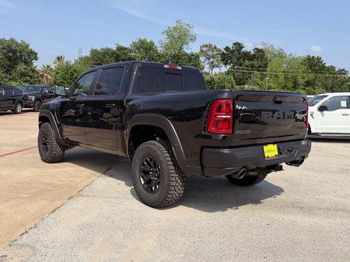 Diamond Black Crystal Pearlcoat 2026 RAM 1500 RHO Crew Cab 4x4 5'7' Box