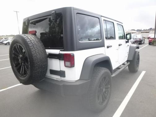 Photo 5 of 15 of 2016 Jeep Wrangler Unlimited Sport