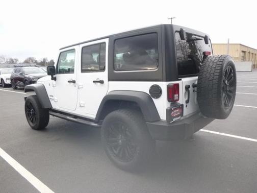 Photo 3 of 15 of 2016 Jeep Wrangler Unlimited Sport