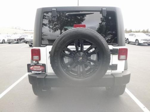 Photo 4 of 15 of 2016 Jeep Wrangler Unlimited Sport
