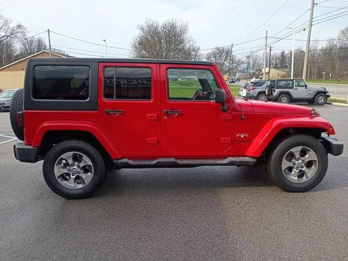 RED 2016 Jeep Wrangler Unlimited Sahara