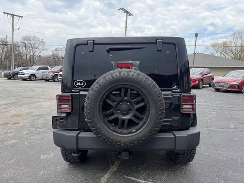 Black 2014 Jeep Wrangler Unlimited Sahara
