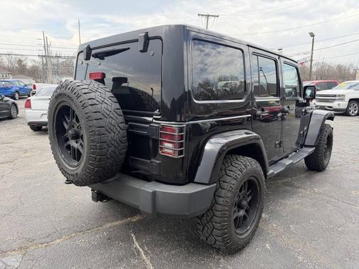 Black 2014 Jeep Wrangler Unlimited Sahara
