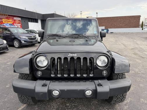 Black 2014 Jeep Wrangler Unlimited Sahara