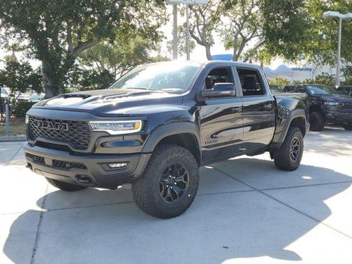 Diamond Black Crystal Pearlcoat 2025 RAM 1500 RHO Crew Cab 4x4 5'7' Box