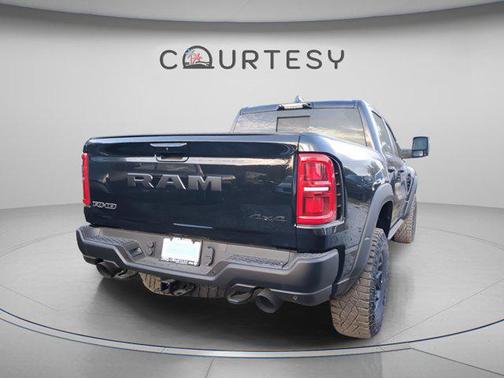 Diamond Black Crystal Pearlcoat 2026 RAM 1500 RHO Crew Cab 4x4 5'7' Box