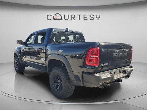 Diamond Black Crystal Pearlcoat 2025 RAM 1500 RHO Crew Cab 4x4 5'7' Box