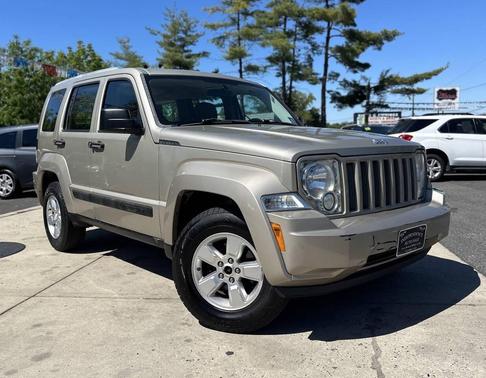 Tan 2011 Jeep Liberty Sport