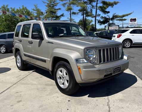 Tan 2011 Jeep Liberty Sport