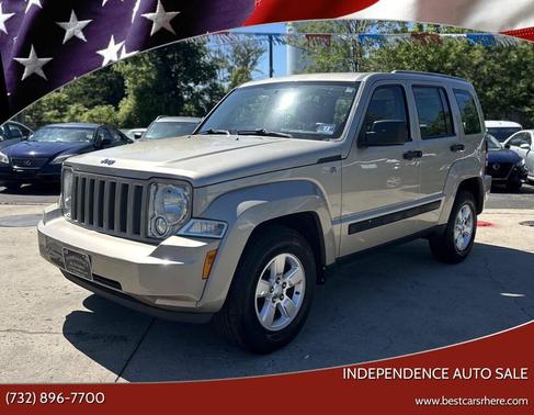 Tan 2011 Jeep Liberty Sport