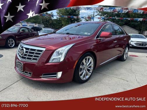 Crystal Red Tintcoat 2014 Cadillac XTS Luxury