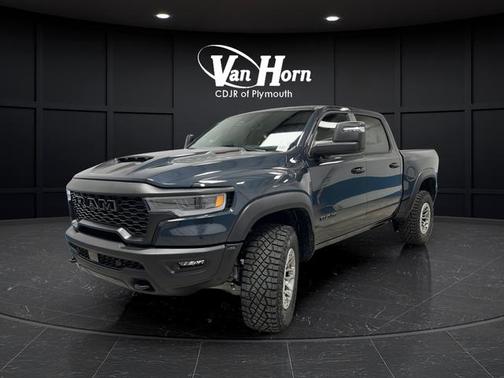 Blue Metallic 2026 RAM 1500 RHO Crew Cab 4x4 5'7' Box