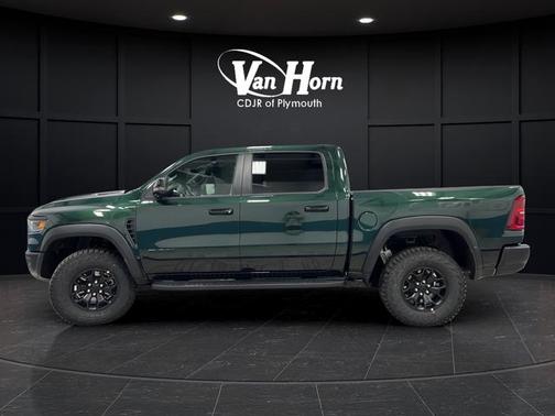 Serrano Green Metallic 2026 RAM 1500 RHO Crew Cab 4x4 5'7' Box
