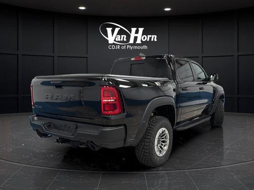 Diamond Black Crystal Pearlcoat 2026 RAM 1500 RHO Crew Cab 4x4 5'7' Box