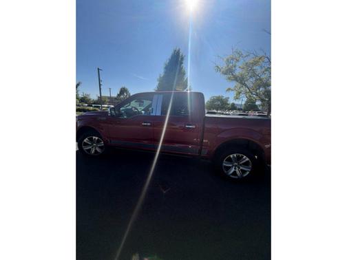 Ruby Red Metallic Tinted Clearcoat 2015 Ford F-150 Platinum