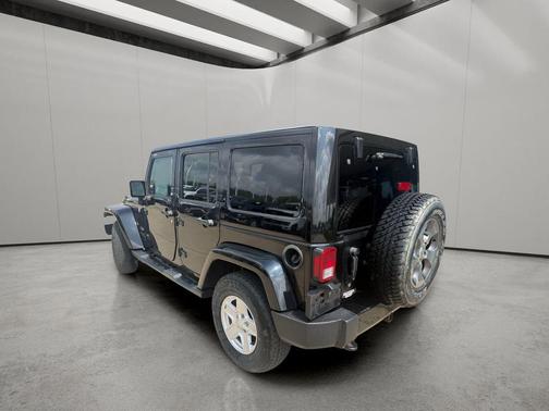 Black 2016 Jeep Wrangler Unlimited Sahara