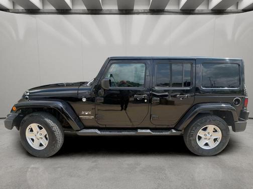 Black 2016 Jeep Wrangler Unlimited Sahara