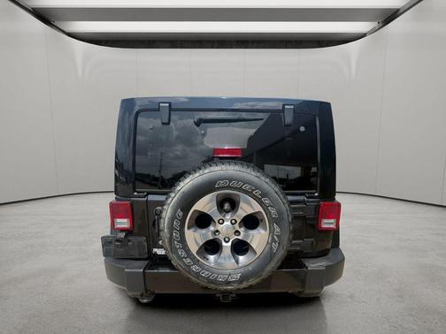 Black 2016 Jeep Wrangler Unlimited Sahara