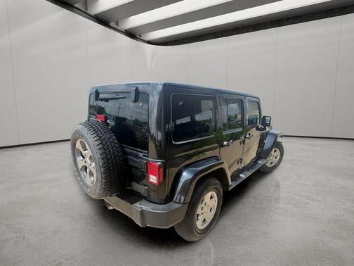 Black 2016 Jeep Wrangler Unlimited Sahara