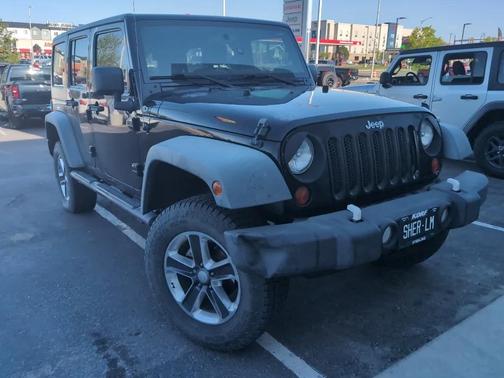 Black Clearcoat 2011 Jeep Wrangler Unlimited Sport
