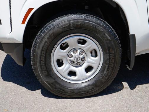 Glacier White 2024 Nissan Frontier S