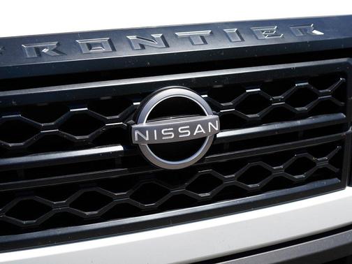 Glacier White 2024 Nissan Frontier S