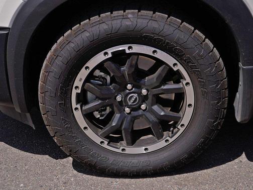 Pearl White Tricoat/Super Black 2024 Nissan Pathfinder Rock Creek 4WD