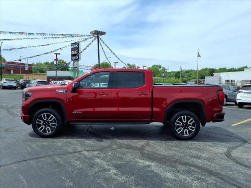 Volcanic Red 2024 GMC Sierra 1500 AT4