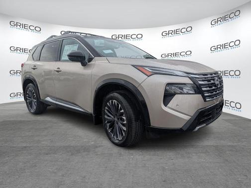 Champagne Silver Metallic/Super Black 2026 Nissan Rogue Platinum