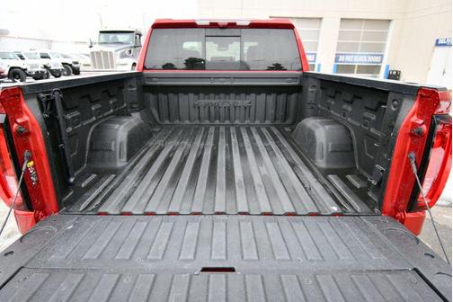 Volcanic Red Tintcoat 2023 GMC Sierra 1500 AT4X