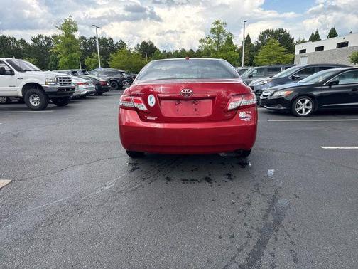 Red 2010 Toyota Camry LE