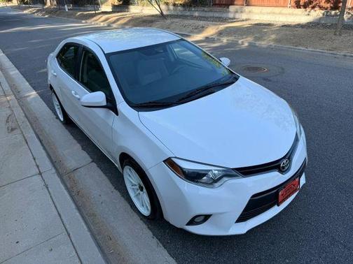 White 2016 Toyota Corolla LE Plus