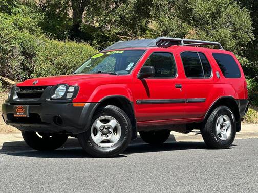 Molten Lava Clearcoat Metallic 2003 Nissan Xterra XE