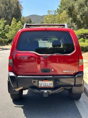 Molten Lava Clearcoat Metallic 2003 Nissan Xterra XE