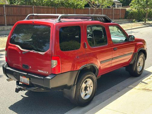 Molten Lava Clearcoat Metallic 2003 Nissan Xterra XE