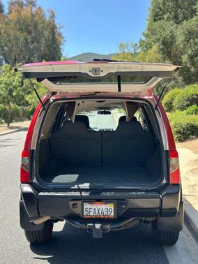 Molten Lava Clearcoat Metallic 2003 Nissan Xterra XE