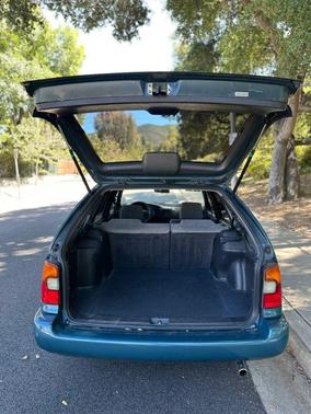 Green 1995 Toyota Corolla DX