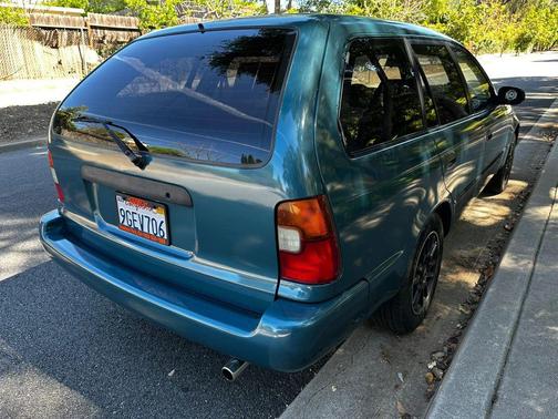Green 1995 Toyota Corolla DX