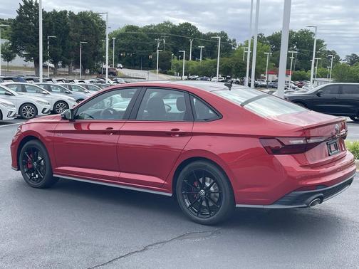 Red 2026 Volkswagen Jetta GLI 2.0T Autobahn