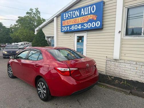 Red 2015 Toyota Corolla LE