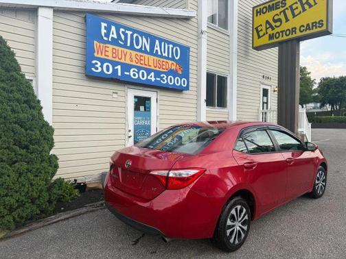 Red 2015 Toyota Corolla LE