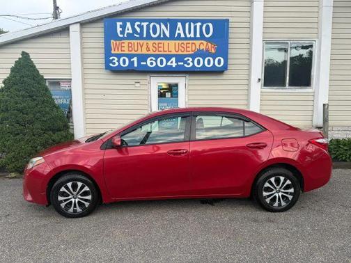Red 2015 Toyota Corolla LE