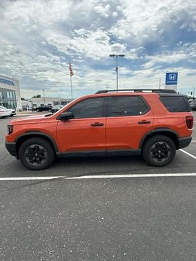 Sunset Orange 2026 Honda Passport TrailSport
