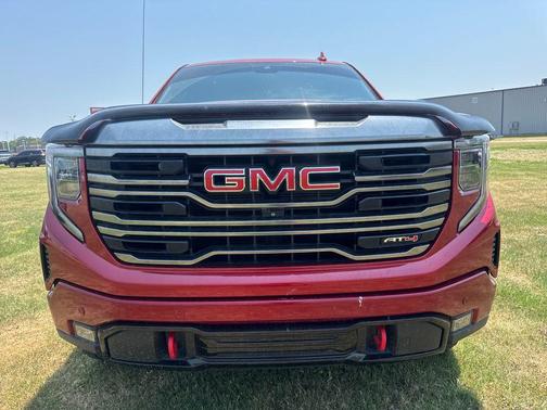 Volcanic Red Tintcoat 2023 GMC Sierra 1500 AT4