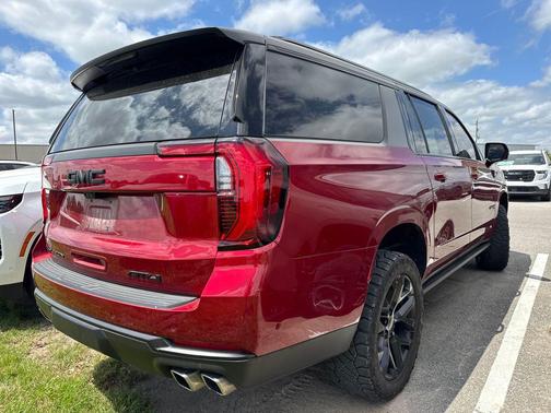 Volcanic Red Tintcoat 2025 GMC Yukon XL 4WD AT4