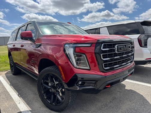 Volcanic Red Tintcoat 2025 GMC Yukon XL 4WD AT4